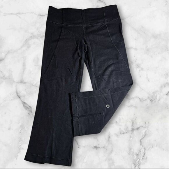 Lululemon Size 4 Black Flare Slit Leggings - Picture 2 of 3